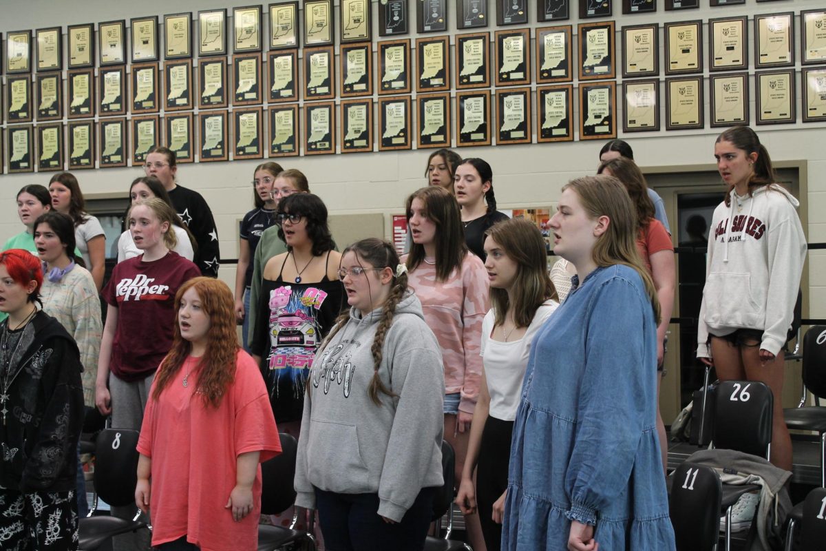 The choir sings in preparation for state qualifiers. Shelby Stevens says, "She is excited to go to Ismma and sing."