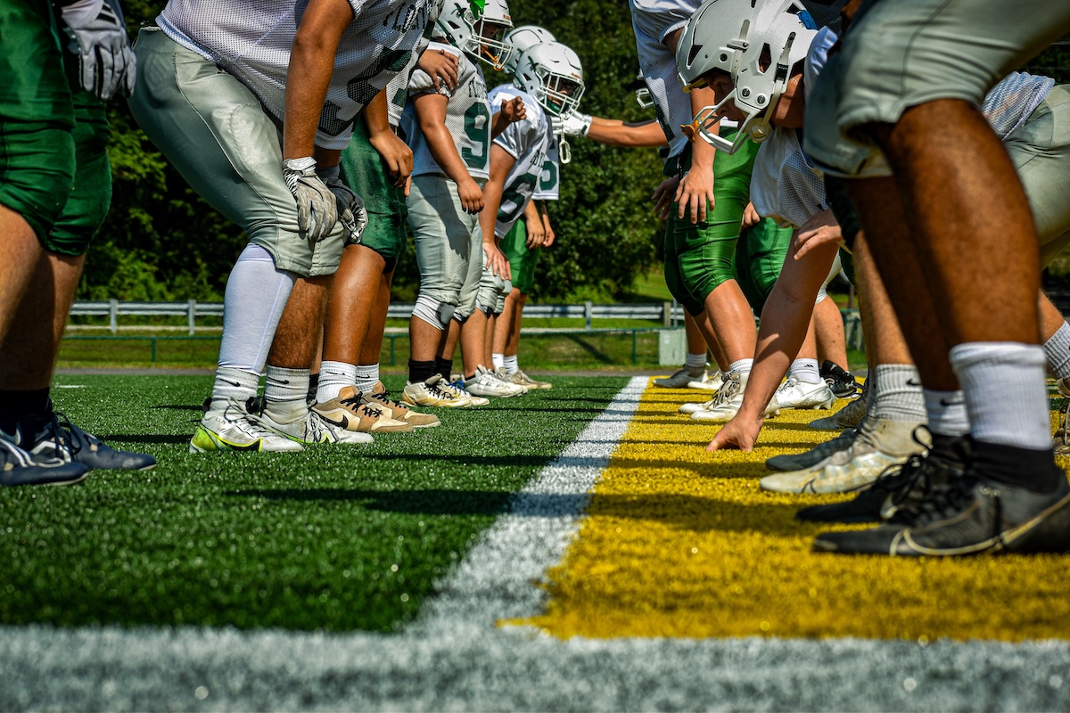 The varsity football team lines up during a practice on Aug. 11.