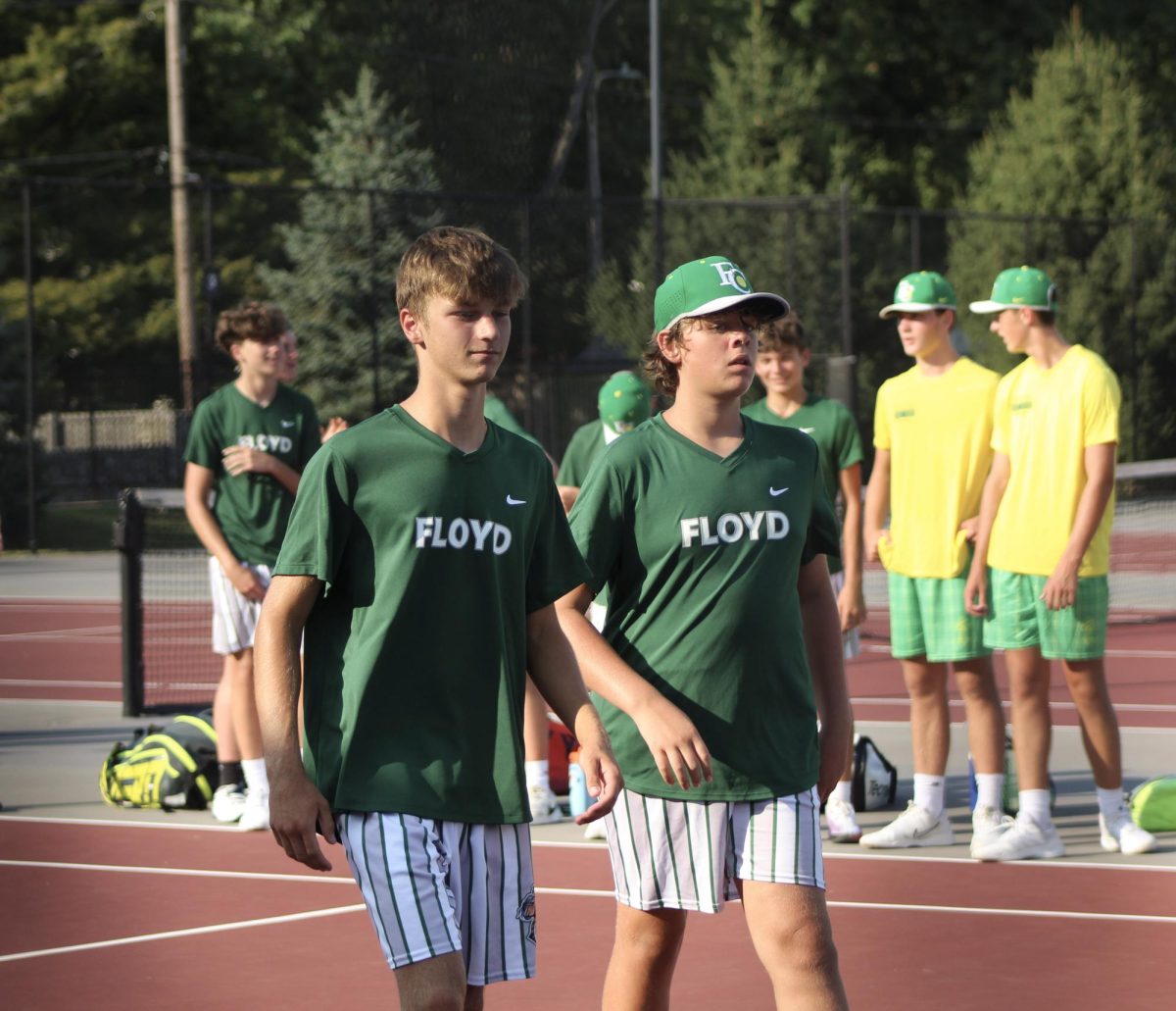 Freshman Sergio Periago and Sophomore Dane Kinnett walk to shake hands with opposing coaches and players.