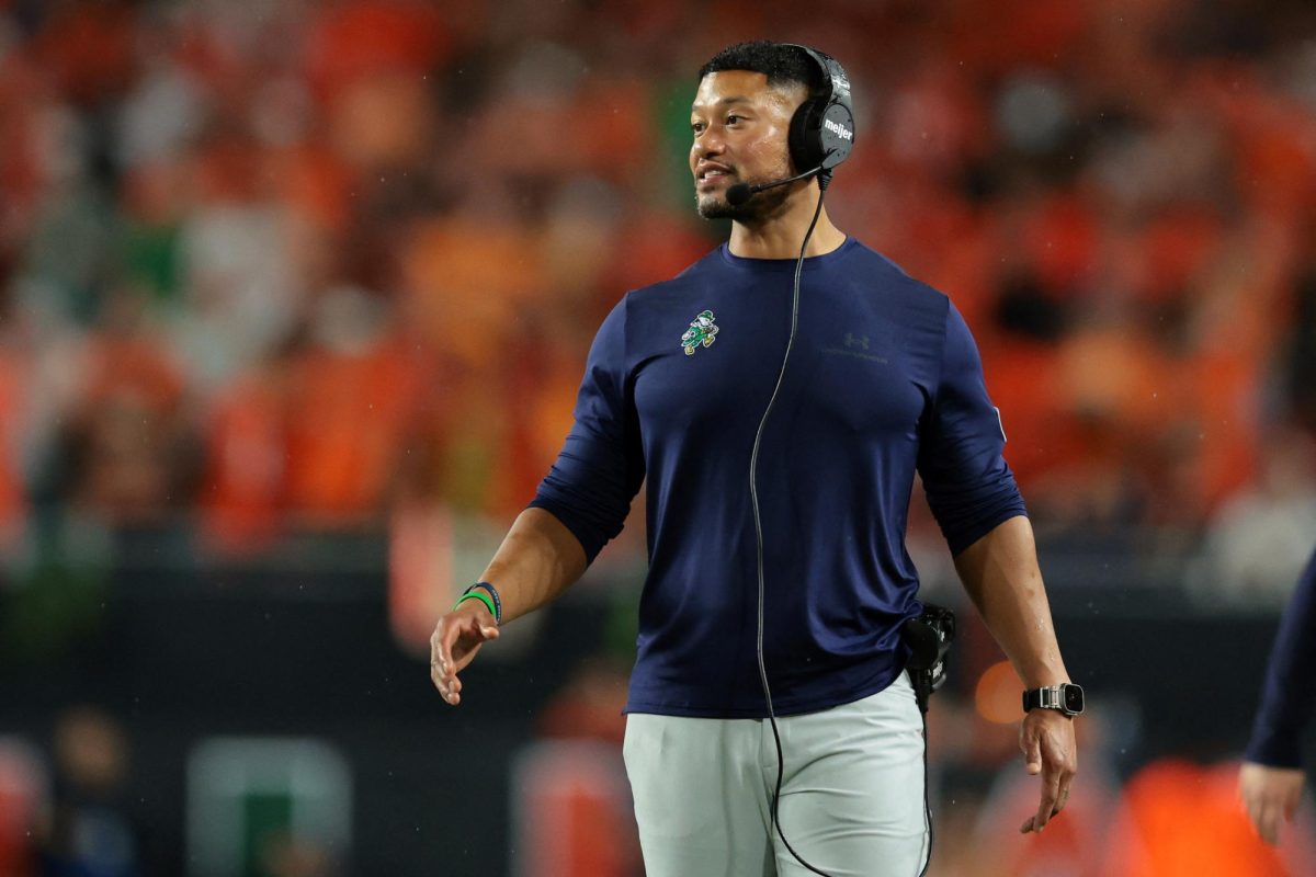 Aug 31, 2025; Miami Gardens, Florida, USA; Notre Dame Fighting Irish head coach Marcus Freeman reacts during the second quarter at Hard Rock Stadium. Mandatory Credit: Sam Navarro-Imagn Images