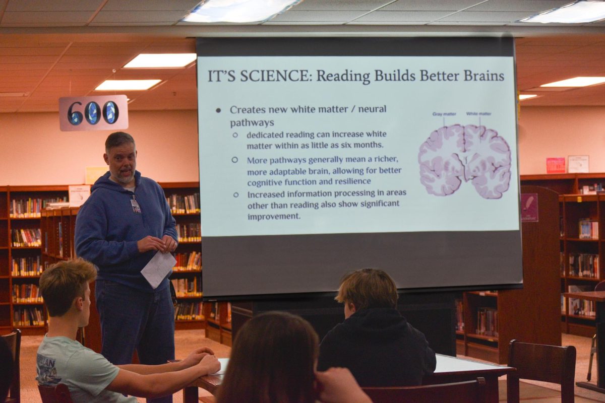 Mr. Roming talks about reading and the science behind it during second period.