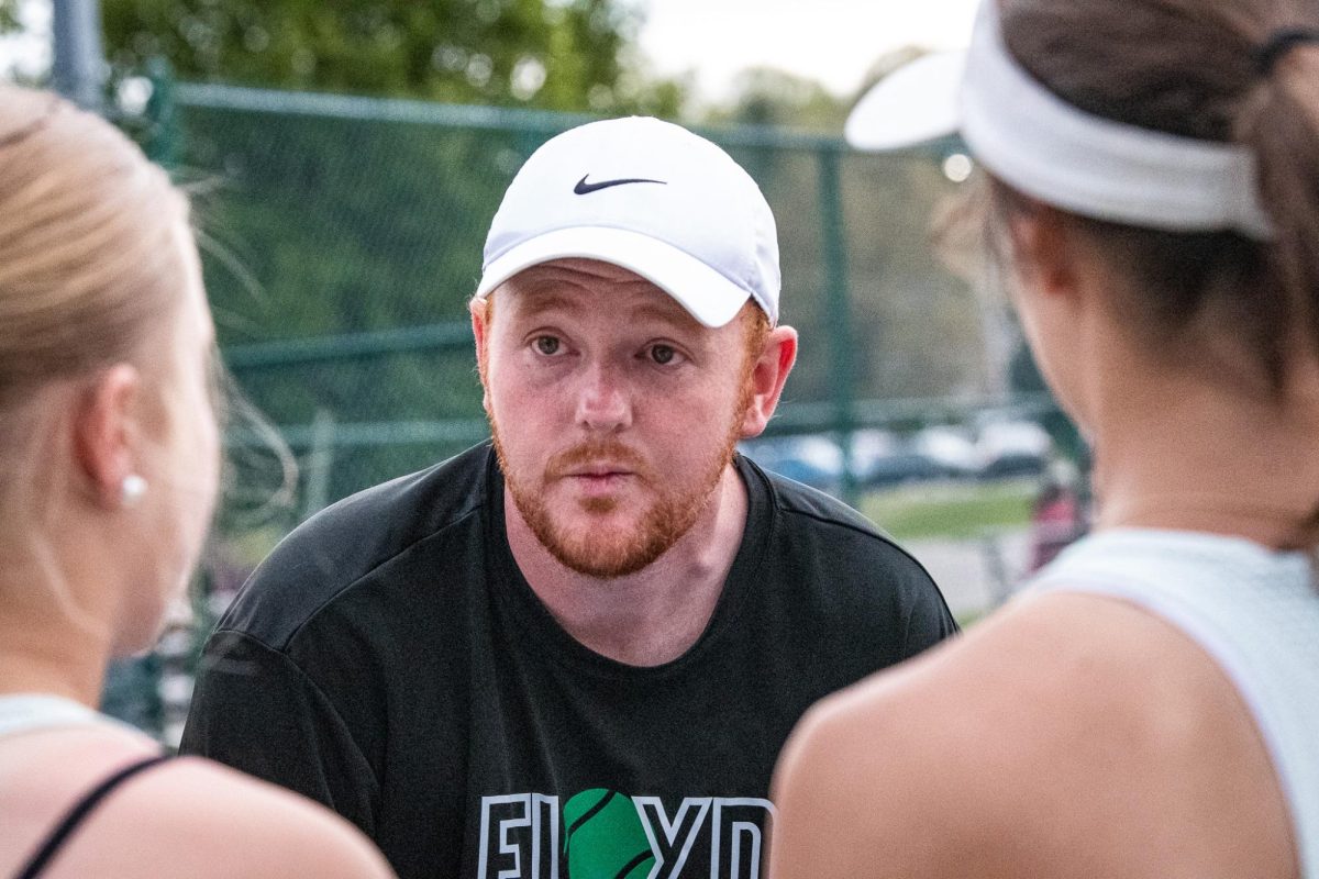 Coach Tanner Goss talks to the girls before their match against Avon.
Photo by: Ryan Miller