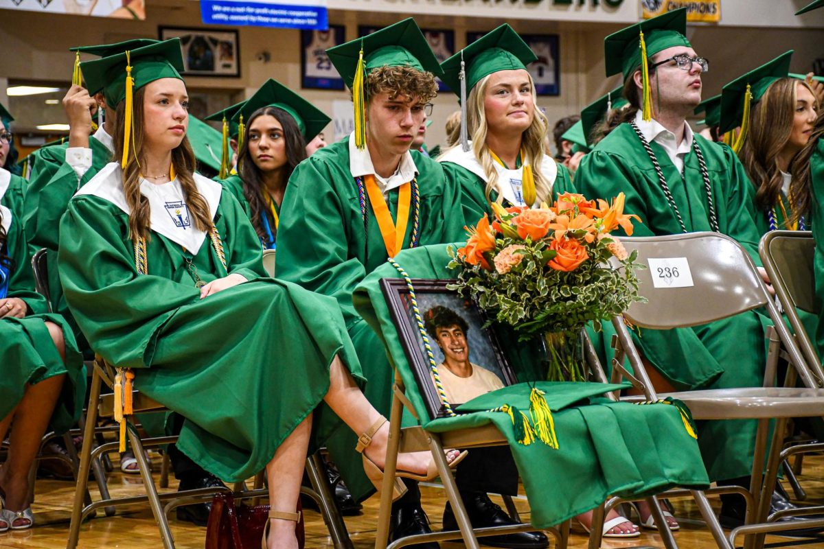 A seat was saved for late classmate Noah Maddox, who was honored during the graduation ceremony by class president Tucker Harris.